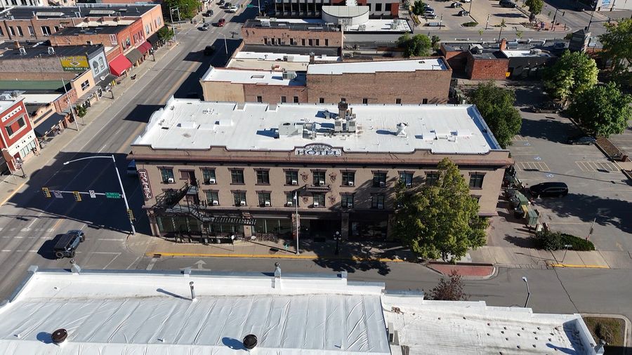 Kalispell Grand Hotel — overhead view of the full building and downtown Kalispell